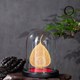 Lá bồ đề mạ vàng và tượng Bác Hồ Chí Minh