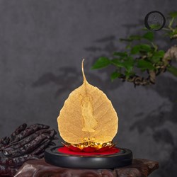 Lá bồ đề mạ vàng và tượng phật