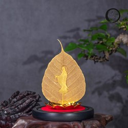 Lá bồ đề mạ vàng và tượng phật