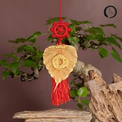 Lá bồ đề mạ vàng và đồng xu Bảo Đại