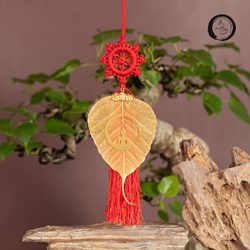 Lá bồ đề mạ vàng gắn biểu tượng phật ngồi Thiền